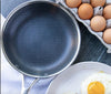 Stainless steel frying pan with non-stick coating for effortless cooking