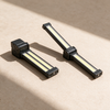 Work light shown folded flat and opened out to show the hinge range