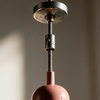 Close-up of the ceiling rose and adjustable cord grip on the pendant light