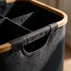 Close-up of the carry handle and central divider on the laundry basket