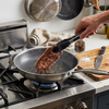 Stainless steel frying pan with non-stick coating for effortless cooking lifestyle photo