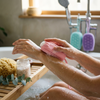 Silicone Body Scrubber with Soap Dispenser lifestyle photo