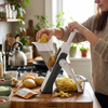 Kitchen Slicer With Adjustable Thickness And Collection Container lifestyle photo