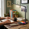 Contemporary Adjustable LED Table Lamp With Charging Function lifestyle photo